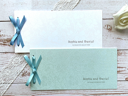 Satin Bow cheque books in white pearl and turquoise broderie